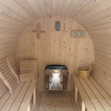 Interior of Bayther traditional barrel sauna NZ showing benches, heater and solid timber construction